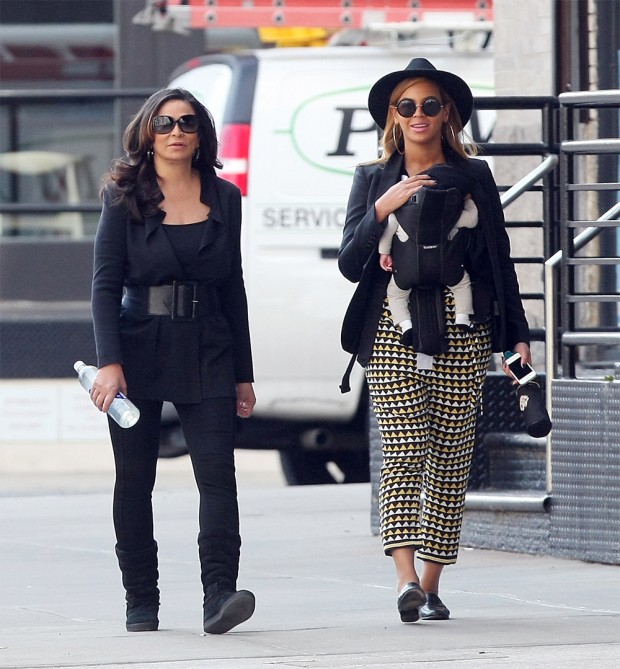 Beyonce is all smiles as she goes for a stroll on Monday afternoon with her new baby Blue Ivy Carter and mom Tina Knowles in Tribeca. Beyonce is seen holding a blue pacifier for Blue Ivy Carter.  Pictured: beyonce knowles,blue ivy carter,beyonce knowles blue ivy carter Ref: SPL369311 120312 NON-EXCLUSIVE Picture by: SplashNews.com Splash News and Pictures Los Angeles: 310-821-2666 New York: 212-619-2666 London: +44 (0)20 7644 7656 Berlin: +49 175 3764 166 photodesk@splashnews.com World Rights 