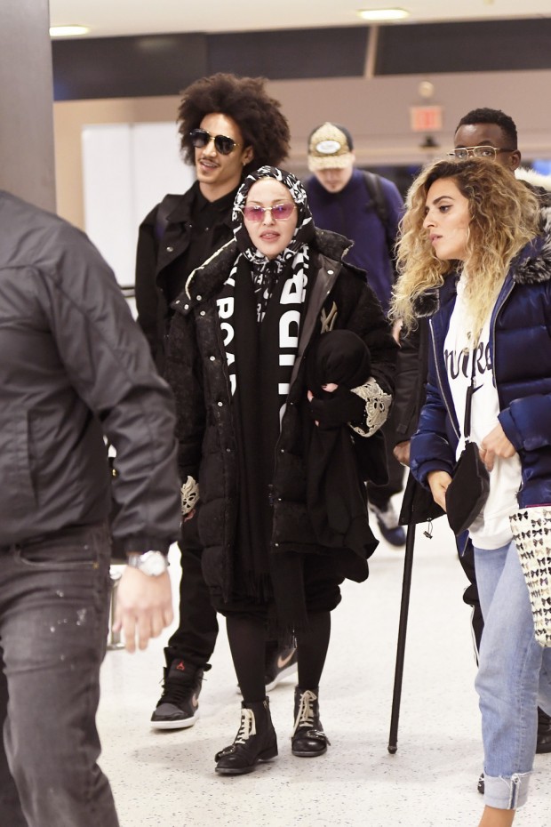 Madonna And Her Boyfriend Ahlamalik And Her Kids Are Seen Arriving At JFK International Airport To Catch A Flight Out Of The City This Evening