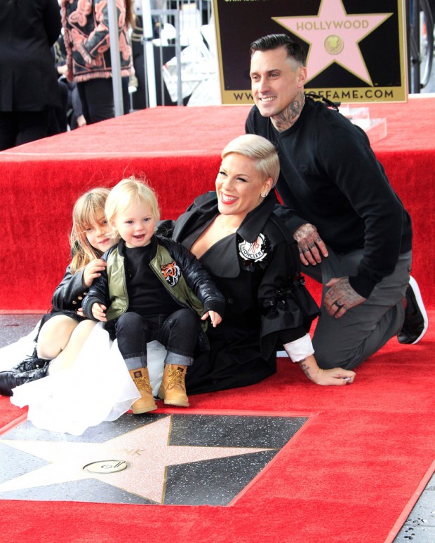 Mandatory Credit: Photo by NINA PROMMER/EPA-EFE/REX/Shutterstock (10095133o) US singer Pink sits on her star with daughter Willow Sage Hart, son Jameson Moon Hart and husband Carey Hart as she receives the 2,656th Star on the Hollywood Walk of Fame in Hollywood, California, USA, 05 February 2019. The star was dedicated in the Category of Recording. Pink receives a star on the Hollywood Walk of Fame, Los Angeles, USA - 05 Feb 2019 